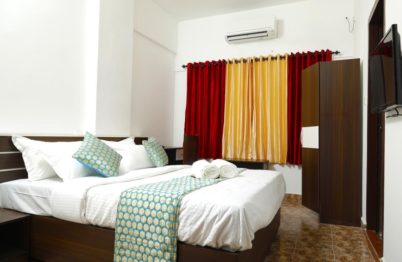 Puthens Clifton Inn กัตตะยัม ภายนอก รูปภาพ